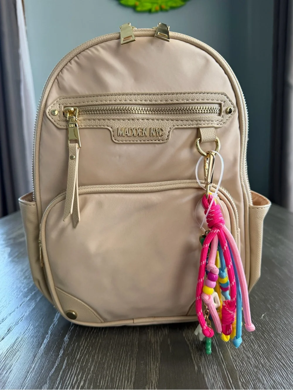 Madden NYC Cream Mini Backpack with Colorful Tassel Charm